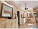 Elegant primary bathroom features double sinks, granite counters, and mirrors, offering a spa-like experience at 2080 Village Station Xing, Smyrna, GA 30080