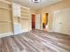 This bedroom has wood floors and a built in closet and shelving system at 2080 Village Station Xing, Smyrna, GA 30080