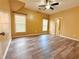 Sunny bedroom with hardwood floors, ceiling fan, and neutral paint at 2080 Village Station Xing, Smyrna, GA 30080