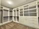 Spacious walk-in closet with custom shelving, drawers, and ample storage space at 2080 Village Station Xing, Smyrna, GA 30080