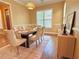Elegant dining room featuring hardwood floors, decorative lighting, and a well-appointed table setting at 2080 Village Station Xing, Smyrna, GA 30080