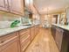 Stylish kitchen with granite countertops, stainless steel appliances, and rich wood cabinets at 2080 Village Station Xing, Smyrna, GA 30080