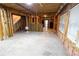 Unfinished basement with exposed beams and concrete flooring at 4055 Vista Point Ln, Suwanee, GA 30024