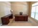 Home office featuring neutral walls, carpet, and large windows for ample natural light at 4055 Vista Point Ln, Suwanee, GA 30024