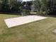 Grassy field featuring a sand volleyball court with manicured lawn at 4055 Vista Point Ln, Suwanee, GA 30024