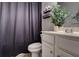 Contemporary bathroom with a double sink vanity, modern fixtures, and stylish decor at 5601 Savannah River Rd, Atlanta, GA 30349