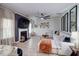 Spacious living room features a modern fireplace, stylish decor, and a comfortable sectional sofa at 5601 Savannah River Rd, Atlanta, GA 30349