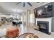 Open-concept living room and kitchen area features modern lighting, breakfast nook, and neutral color palette at 5601 Savannah River Rd, Atlanta, GA 30349