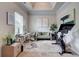 Well-lit sitting area with modern decor, a desk, and an exercise bike at 5601 Savannah River Rd, Atlanta, GA 30349