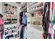 Spacious walk-in closet with custom shelving and ample storage space at 5601 Savannah River Rd, Atlanta, GA 30349