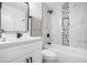 Bright bathroom with tub, shower, and decorative tile at 904 Fairburn Nw Pl, Atlanta, GA 30331