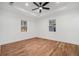 Bright bedroom with hardwood floors and a ceiling fan at 904 Fairburn Nw Pl, Atlanta, GA 30331