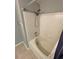 Bathroom with a subway tile shower, bathtub, and chrome showerhead at 211 Buckland Dr, Alpharetta, GA 30022