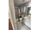 Bathroom with tile floor, toilet, bathtub, shower, and sink vanity at 211 Buckland Dr, Alpharetta, GA 30022