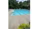 Enjoy the community pool with its expansive layout and ample seating at 211 Buckland Dr, Alpharetta, GA 30022
