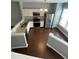 Bright kitchen boasts white cabinets, granite countertops, and stainless steel appliances at 211 Buckland Dr, Alpharetta, GA 30022
