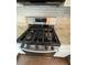 Stainless steel Samsung gas range with five burners at 211 Buckland Dr, Alpharetta, GA 30022