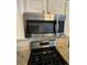 Stainless steel stovetop and microwave at 211 Buckland Dr, Alpharetta, GA 30022