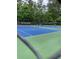 Outdoor tennis court offers a sporty amenity for residents in the Devonshire community at 211 Buckland Dr, Alpharetta, GA 30022