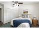 Bright bedroom with ceiling fan, modern rug, and large closet at 448 Teal Ct, Roswell, GA 30076