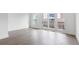 Bright room with hardwood floors and a balcony at 507 Motivation Nw Cir, Atlanta, GA 30309