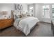 Serene bedroom with a plush bed, soft lighting, and modern decor, creating a relaxing retreat at 507 Motivation Nw Cir, Atlanta, GA 30309