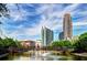 Beautiful cityscape view with modern buildings, lush greenery, and a charming bridge at 507 Motivation Nw Cir, Atlanta, GA 30309