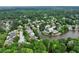 Lakeside community with mature trees and winding streets offers a peaceful and scenic environment at 5070 Riverlake Dr, Peachtree Corners, GA 30097