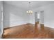 Formal dining room with recessed paneling at 5070 Riverlake Dr, Peachtree Corners, GA 30097