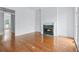 Hardwood floor living room with fireplace at 5070 Riverlake Dr, Peachtree Corners, GA 30097