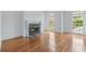 Living room features a fireplace and hardwood floors at 5070 Riverlake Dr, Peachtree Corners, GA 30097