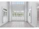 Bright sun room with white shutters at 5070 Riverlake Dr, Peachtree Corners, GA 30097