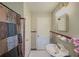 Vintage bathroom with a unique vanity, stylish tile accents, and a coordinated shower curtain at 646 Quillian Ave, Decatur, GA 30032