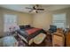 Bedroom with hardwood floors, ceiling fan, and natural light at 646 Quillian Ave, Decatur, GA 30032