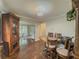Dining area with wood floors and dark wooden dining set at 646 Quillian Ave, Decatur, GA 30032