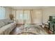 Bright living room featuring hardwood floors and neutral walls at 646 Quillian Ave, Decatur, GA 30032