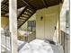 Apartment entrance features a secure entry door, staircase, and metal railing for safety at 802 Lismore Se # 2, Smyrna, GA 30080