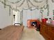 Bedroom featuring green leaf accents, a new Onn TV, and a wooden dresser at 3419 White Sands Way, Suwanee, GA 30214