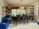 Cozy dining area featuring a wooden table, chairs, and a window view at 3419 White Sands Way, Suwanee, GA 30214