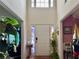 Bright foyer with a high ceiling, decorative door, and natural light from transom window at 3419 White Sands Way, Suwanee, GA 30214