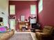Living room features a brick fireplace, plush seating, and large windows at 3419 White Sands Way, Suwanee, GA 30214