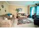 Comfortable living room with plush sofas and bright natural light at 3419 White Sands Way, Suwanee, GA 30214