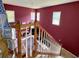 Staircase view of a spacious living area with fireplace and abundant natural light at 3419 White Sands Way, Suwanee, GA 30214