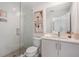 Modern bathroom featuring a glass-enclosed shower, stylish vanity, and neutral decor at 515 Motivation Nw Cir, Atlanta, GA 30309