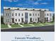 Modern townhome exterior with a clean design and well-maintained landscaping at 515 Motivation Nw Cir, Atlanta, GA 30309