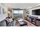 Comfortable living room featuring hardwood floors, scenic views and comfortable seating at 1501 Clairmont Rd # 1522, Decatur, GA 30033