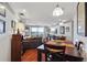 Open-concept living room and dining area with hardwood floors and large windows at 1501 Clairmont Rd # 1522, Decatur, GA 30033