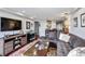 Spacious living room with hardwood floors, neutral paint, and dining area in the background at 1501 Clairmont Rd # 1522, Decatur, GA 30033