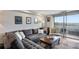 Comfortable living room with hardwood floors, scenic views, and comfortable seating at 1501 Clairmont Rd # 1522, Decatur, GA 30033