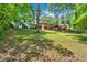 Spacious backyard featuring mature trees and a lush landscape providing shade to the yard at 2210 Polar Rock Sw Ave, Atlanta, GA 30315